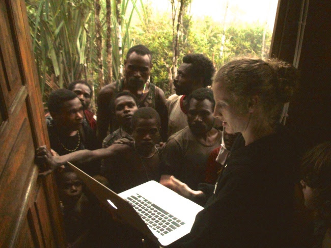 Jennie working together with the Dao people to check a newly translated portion of scripture